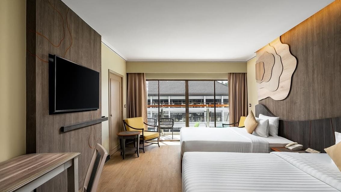 amora-beach-resort-phuket-deluxe-pool-view_13667