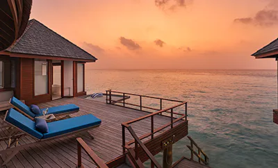 Sunset Over Water Villa