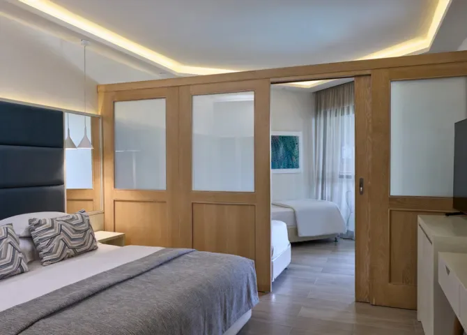 atlantica-aegean-blue-resort-kolympia-family-room-sliding-doors-swim-up-inland-view_13752