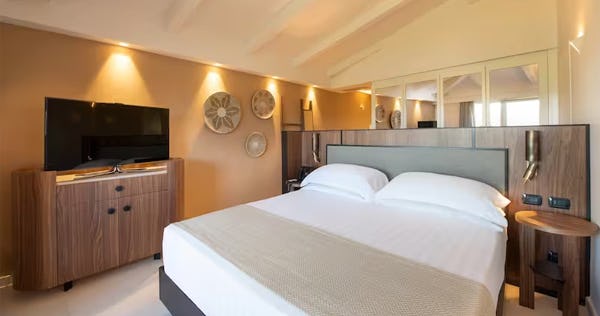 baia-di-chia-resort-sardinia-curio-collection-by-hilton-italy-king-deluxe-accessible-room_12444