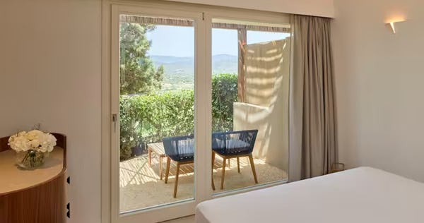 baia-di-chia-resort-sardinia-curio-collection-by-hilton-italy-king-deluxe-room-with-bay-view_12444