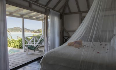 DELUXE POOL COTTAGES