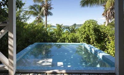 DELUXE POOL COTTAGES