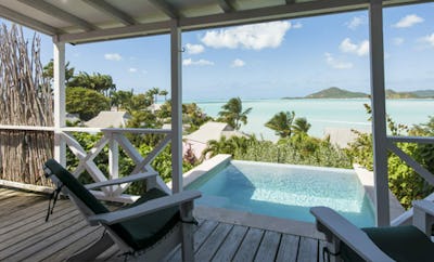 DELUXE POOL COTTAGES