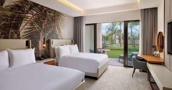 conrad-rabat-arzana-morocco-two-queen-beds-deluxe-room-with-garden-view_11781