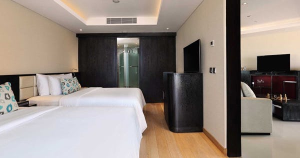 double-six-luxury-hotel-bali-2-bedroom-deluxe-suite-ocean-view-01_11317