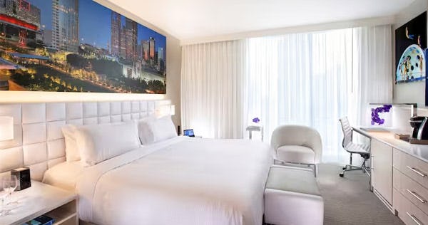hall-arts-hotel-dallas-curio-collection-by-hilton-1-king-bed-guest-room_12045