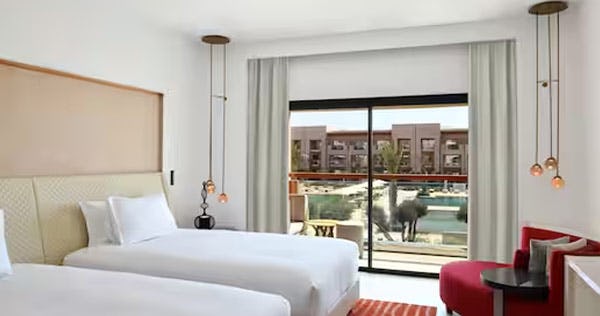 hilton-taghazout-bay-beach-resort-and-spa-morocco-two-double-beds-guest-room-with-pool-view-01_12227