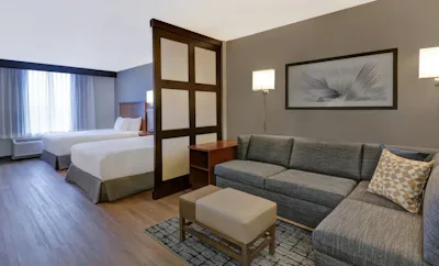 Accessible Two Queen Beds/Tub (with sofa bed)