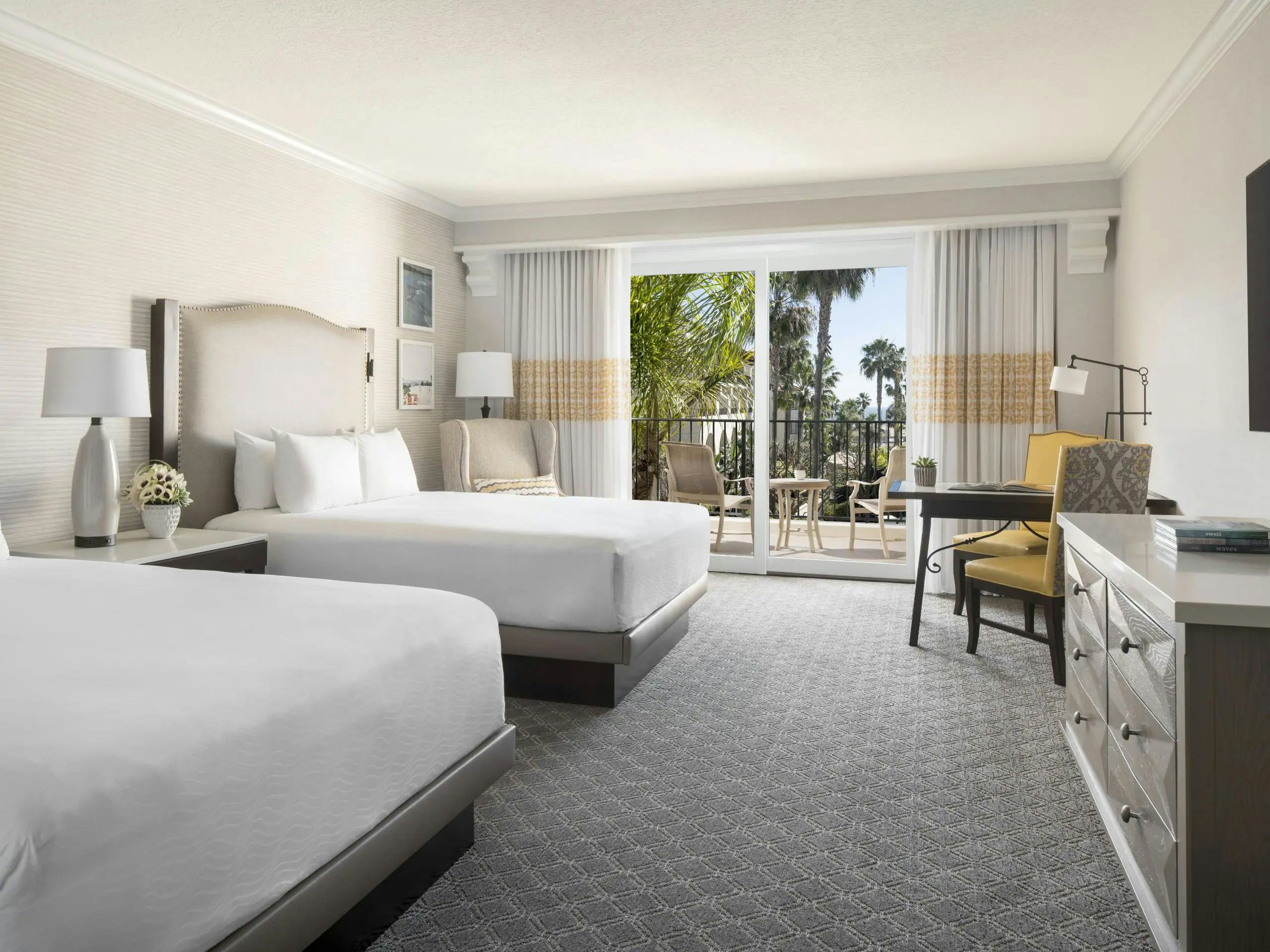 2 Queen Beds Partial Ocean View