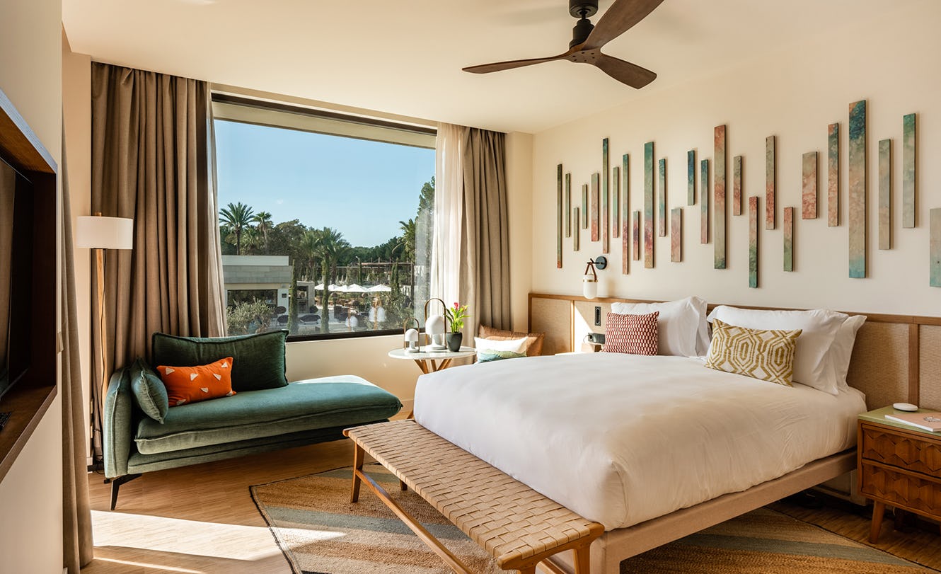 King Bed with Balcony & Resort View