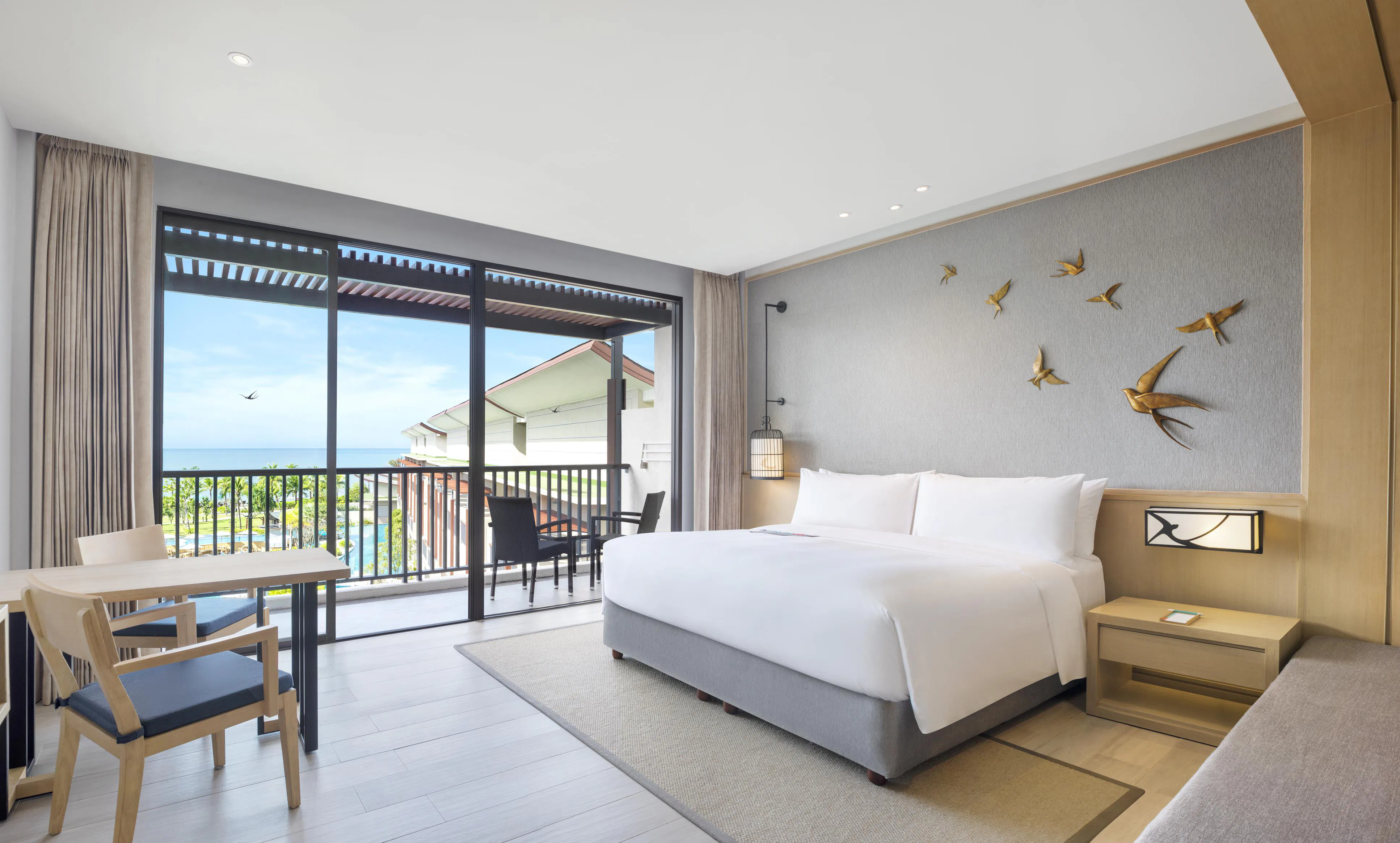 le-meridien-khao-lak-resort-and-spa-larger-guest-room-1-king-sofa-bed-pool-view_7432