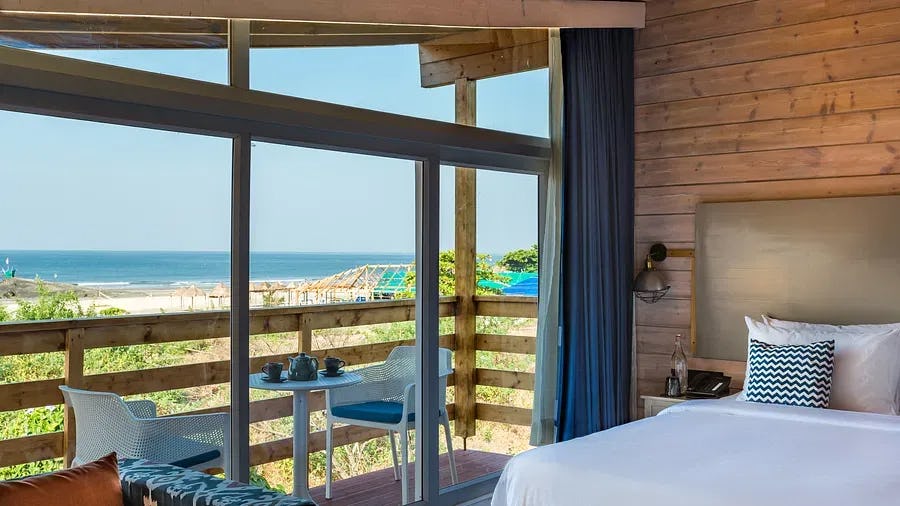 living-room-beach-resort-morjim-deluxe-partial-sea-view-chalet_2854