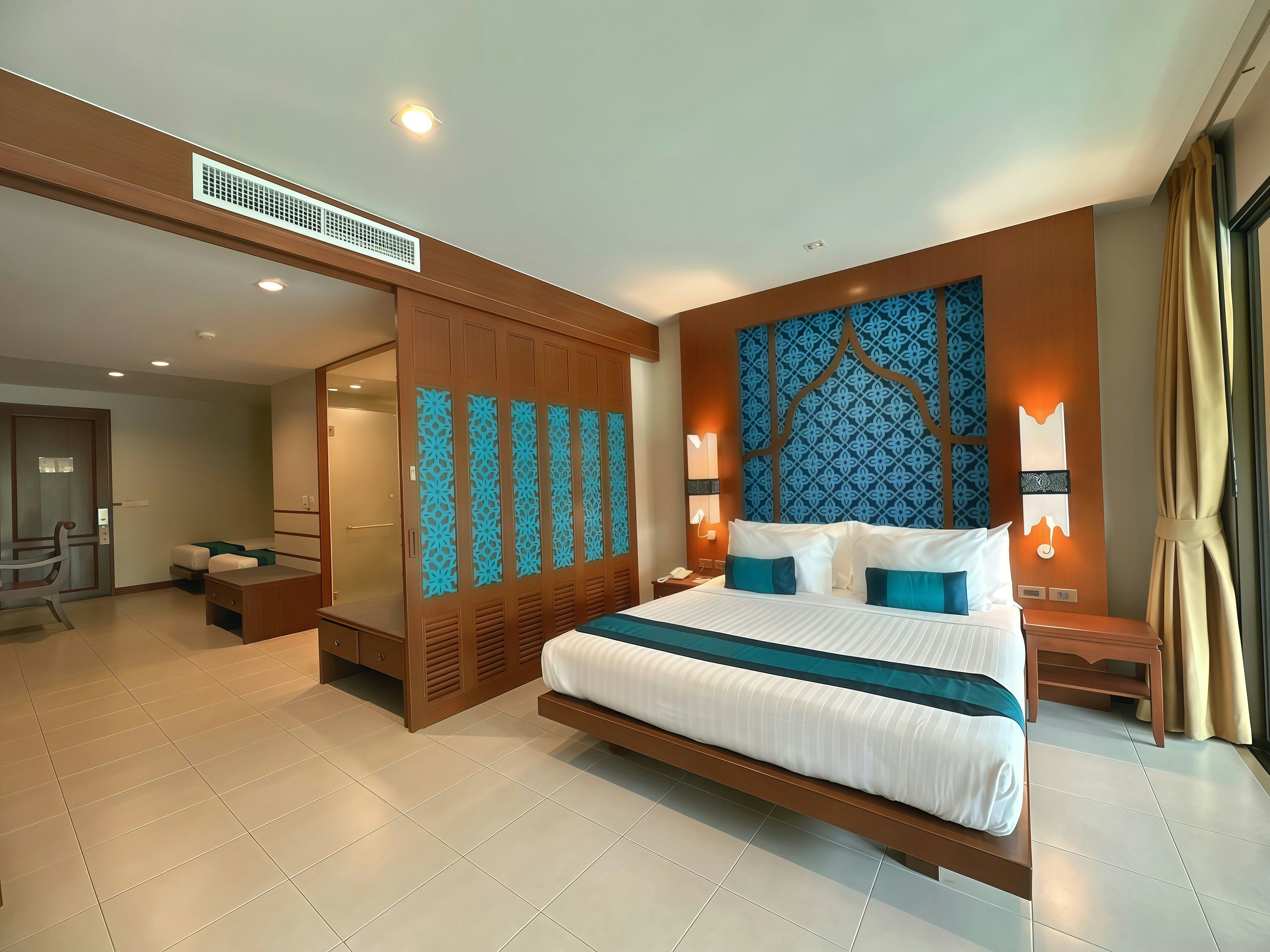 rawai-palm-beach-resort-phuket-deluxe-family-pool-view_3887