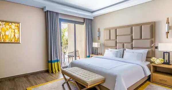 rixos-premium-magawish-suites-and-villas-hurghada-lagoon-deluxe-suite-king-bed-sea-view-01_11796