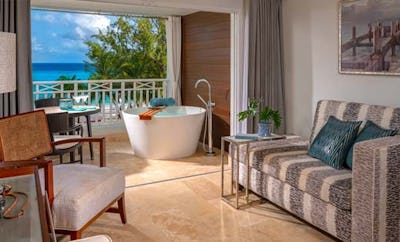 BEACHFRONT CLUB LEVEL SUITE WITH BALCONY TRANQUILITY SOAKING TUB