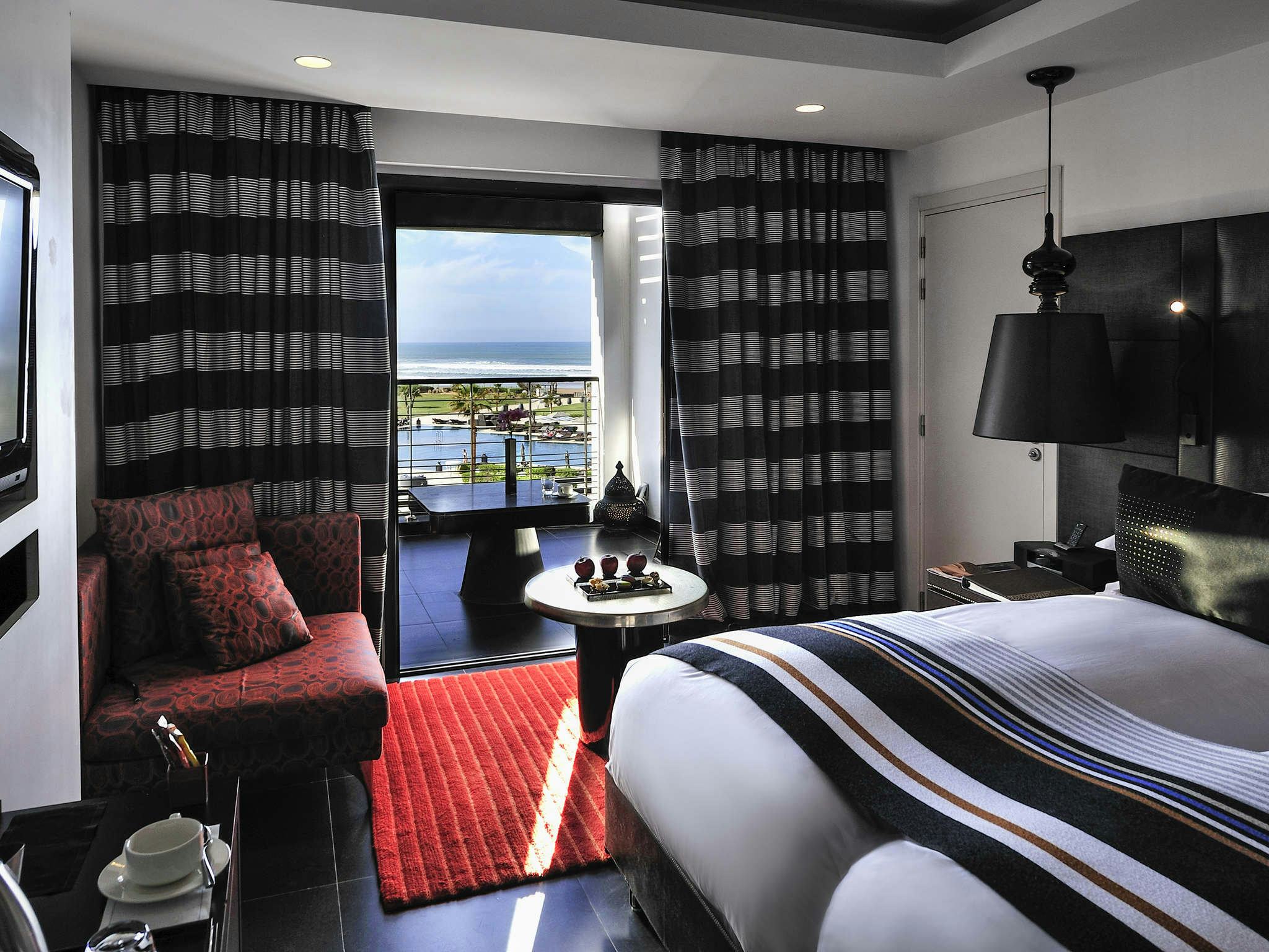 Superior twin room with pool and ocean view