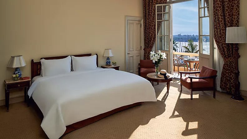 sofitel-winter-palace-luxor-egypt-luxury-room-king-size-bed-nile-view_1801