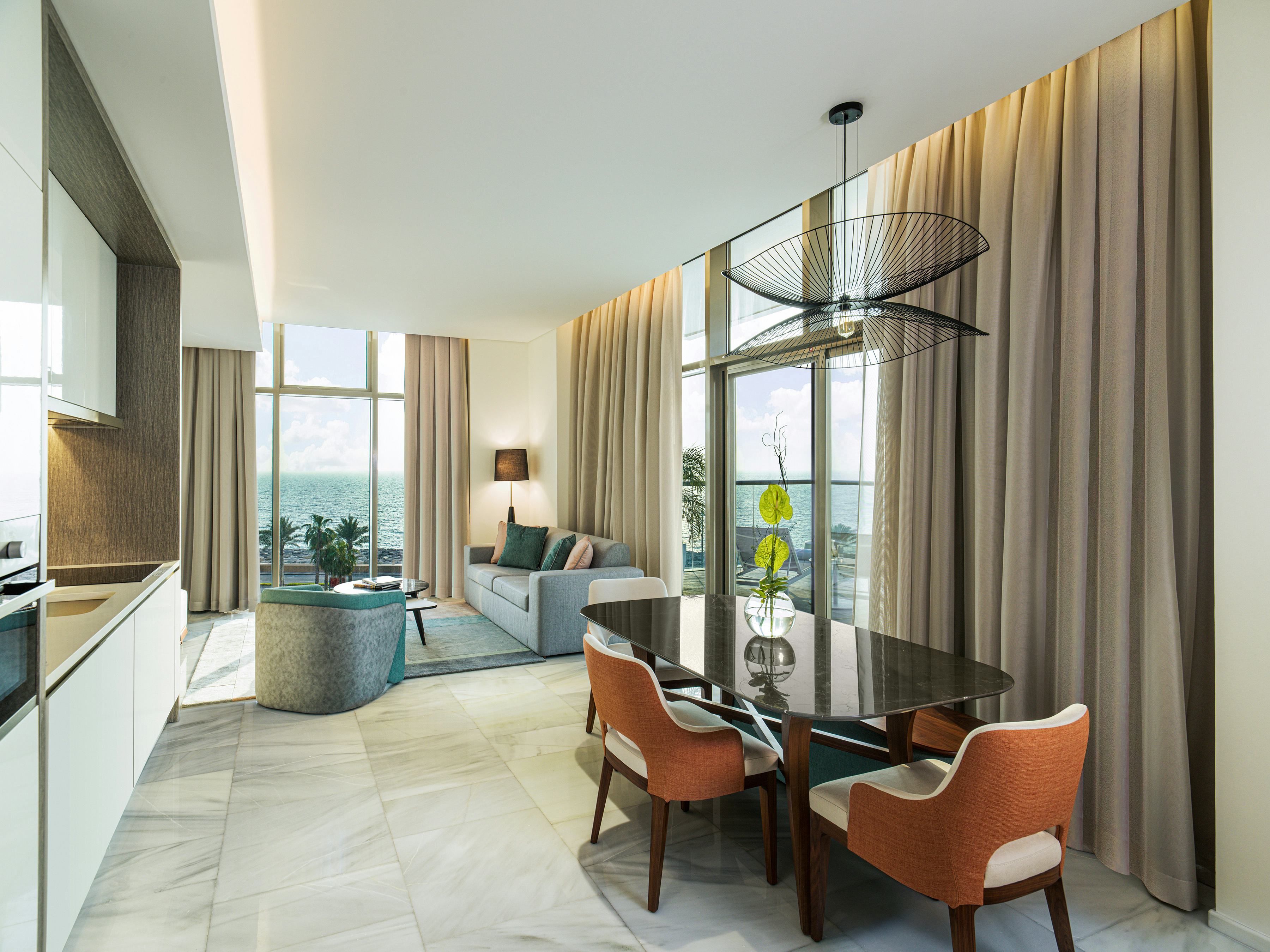 One Bedroom Suite with Kitchen, Balcony, Sofa Bed & Palm Sea View