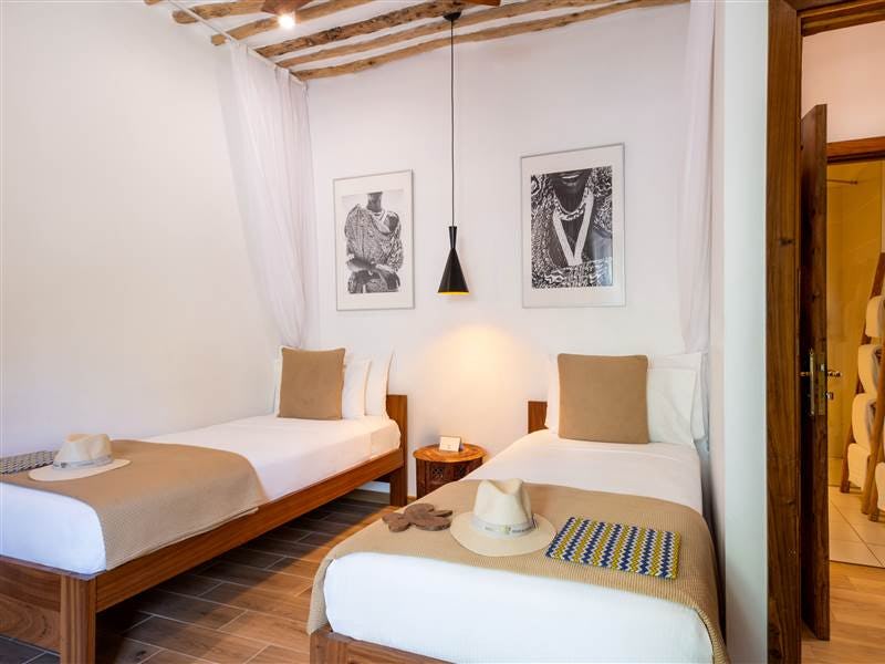 zanzibar-white-sand-luxury-villas-and-spa-tanzania-cinnamon-quadruple-room_13359