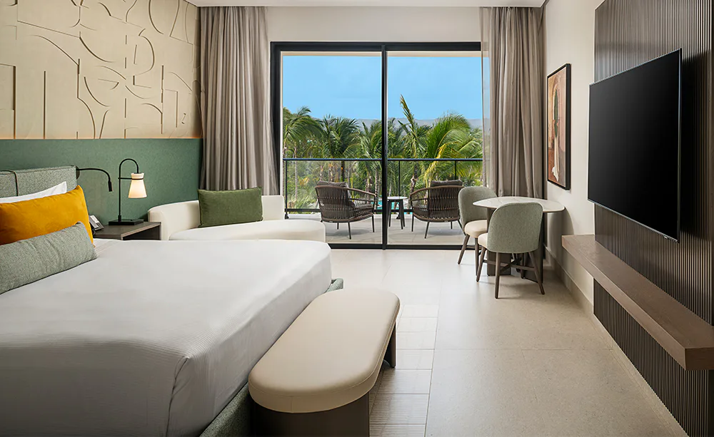 zemi-miches-punta-cana-all-inclusive-resort-curio-collection-by-hilton-club-azure-tropical-view-room-1-king-bed_13693